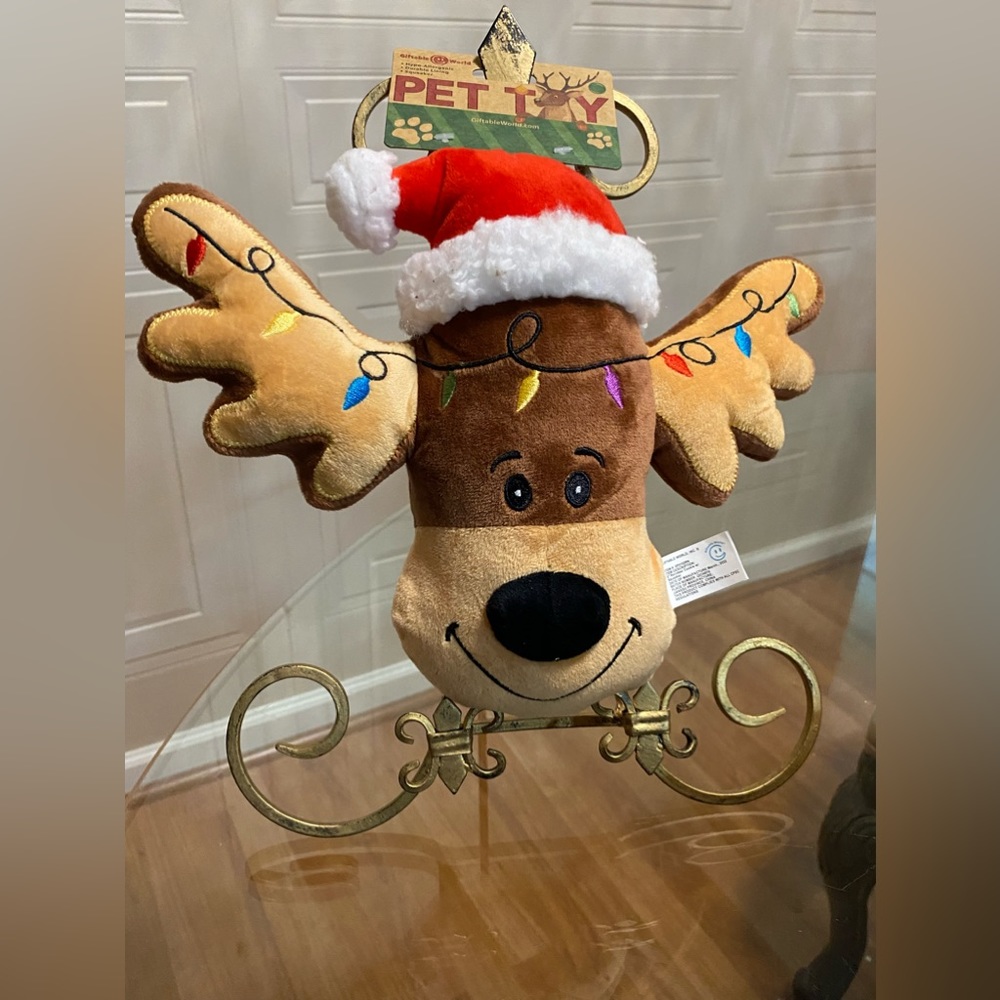 - Brand New Giftable Pinguin With Santa’s Hat 10” Dog Toy With Squeaker.